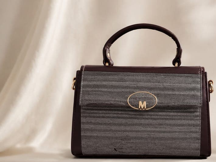 Textured "M" Medallion Bag